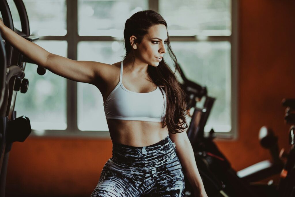 Person starting a fitness for beginners routine in a gym.