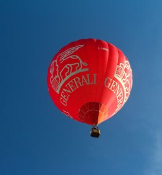 red hot air balloon in the sky